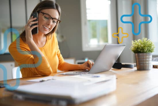 Woman in office talking on phone