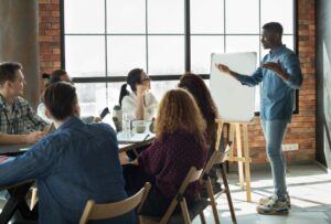 Employees discussing Medicash health plans