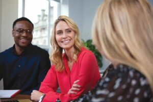 team of 3 people in a meeting