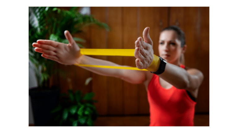 Woman with resistance band shoulder exercises - Medicash Phio