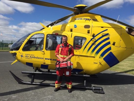 A NWAA crew member with the DEFIGUARD TOUCH 7 donated by Medicash