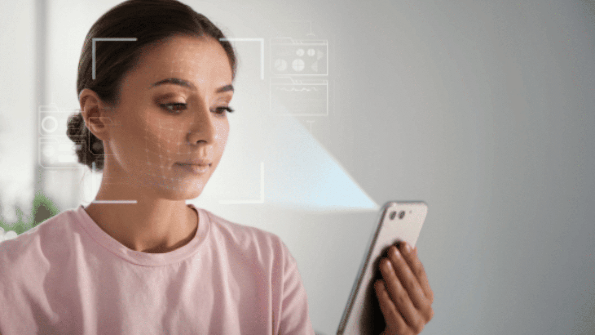 Woman using smartphone to scan face