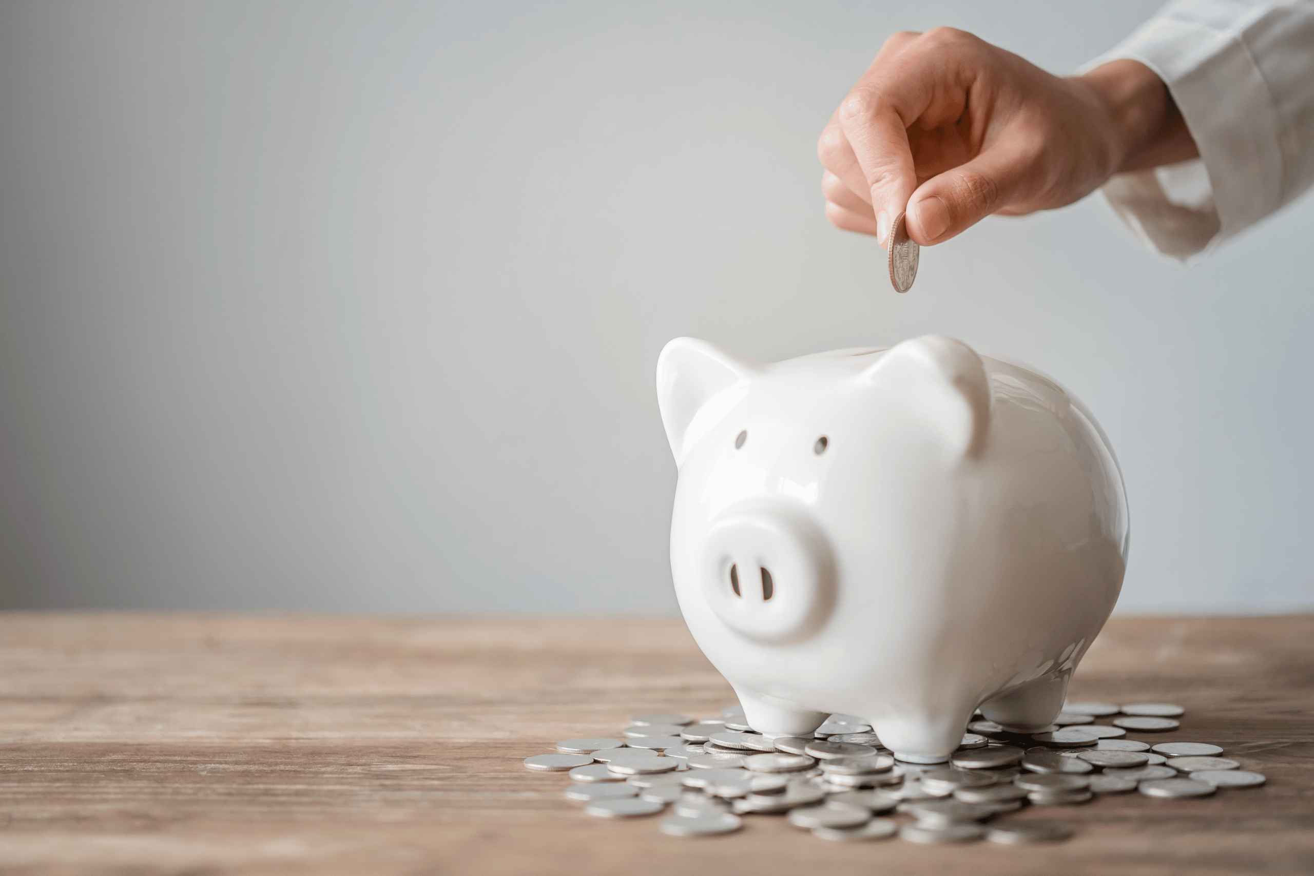 Piggy bank surrounded by pennies